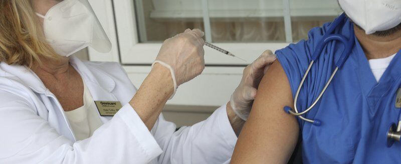 Vaccinations continue as state's COVID death toll tops 12,000